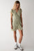 Floral wrap mini dress with ruffled hem in tea flan floral — main image