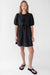 Tie-front babydoll mini dress in black — main image