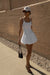 Drop waist bubble hem mini dress in white — main image