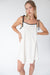 Contrast detail mini dress in beige — main image