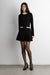 Contrast trim pleated mini dress in black cream — main image