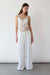 Macrame dress with long tassel overlay detail in white — main image