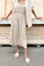 Pleated midi dress in beige — main image