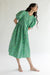Floral puff sleeve midi dress in green — main image