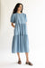 Denim tiered midi dress in light wash — main image