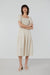 Smocked tiered dress in beige — main image