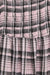 Plaid smocked dress in pink — main image