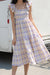 Plaid smocked dress in yellow — main image