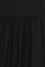 Puff sleeve tiered dress in black — main image