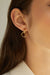 Linked hoop earring in gold — main image