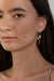 Flat hoop earrings in gold — main image