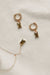 Twisted hoop with zirconia in peridot gold — main image