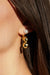 Gold earrings with pearl detail in gold — main image