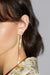 Pearl stud with zirconia chain in gold — main image