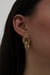 Linked hoop studs in gold — main image