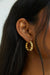Twist hoop earring in gold — main image