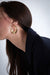 Organic hoop earring in gold — main image
