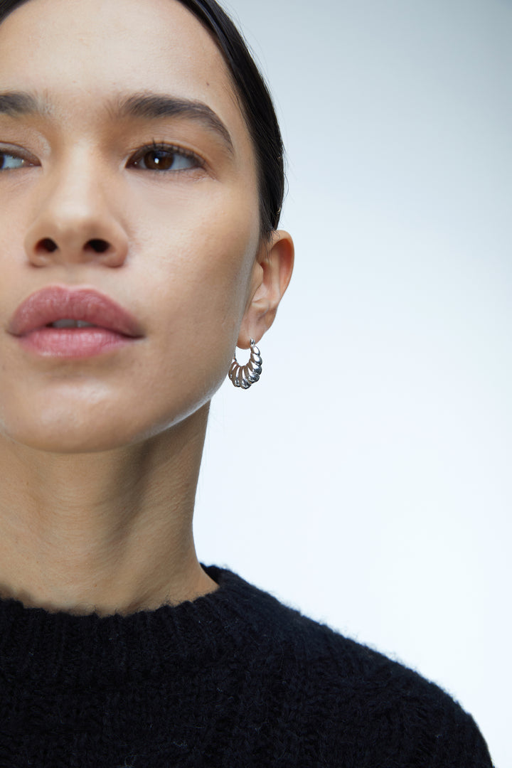 CROISSANT HUGGIE EARRINGS in Silver — alternate angle