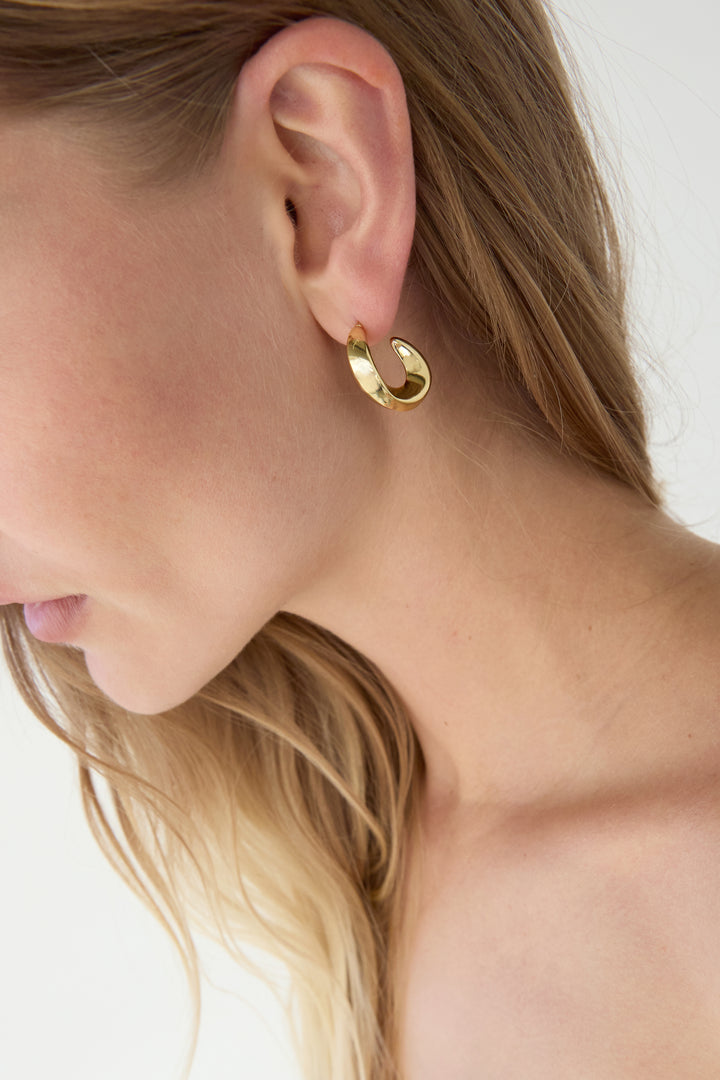 ORGANIC CURVED HOOP EARRINGS in Gold — alternate angle