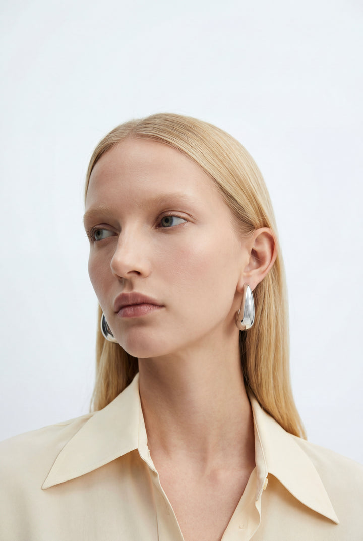 CURVED HOOP EARRINGS in Silver — alternate angle