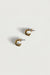Organic curve mini stud earrings in gold — image