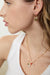 Charm & pearl hoop in gold shell — main image