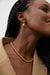 Zirconia and pearl hoops in gold — main image