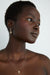 Key charm hoop earring in gold — main image
