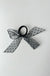 Hair tie with oversized bow in black — main image