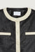 Contrast trim vegan leather jacket in black — main image