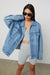 Unisex denim jacket in medium light wash — main image