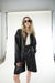 Vegan leather shirt jacket in black — main image