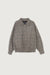 Collared short jacket in black houndstooth — main image