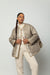 Quilted jacket in beige — main image
