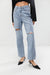 Straight leg jean with distressing in light wash — main image