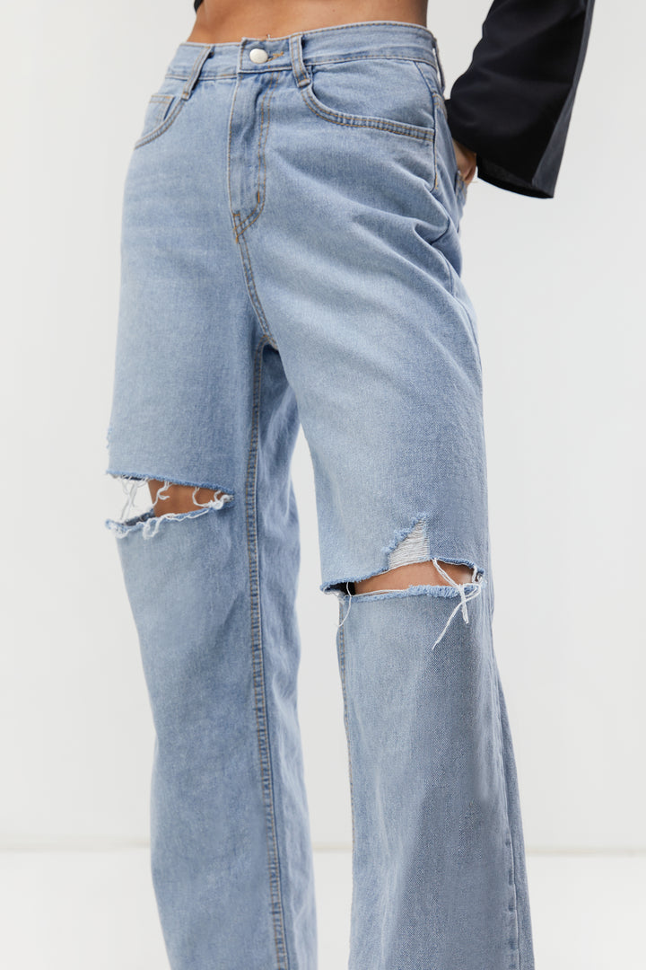 STRAIGHT LEG JEAN WITH DISTRESSING in Light Wash — alternate angle