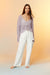 Distressed white jeans in white — main image