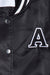 Cropped varsity jacket in black — main image