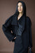 Short double-breasted funnel neck trench coat in black — main image
