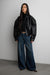 Vegan leather funnel neck jacket with elasticated hem in black — main image