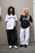 Wide leg parachute pant in black — main image