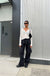 Nylon pants with ruched pockets in black — main image