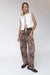 Leopard print pleated pants in brown — main image