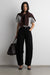 Cropped length twill barrel leg pant in black — main image