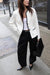 Bottom snap cotton twill pants in black — main image