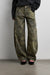 Camo print barrel leg pant in green print — main image