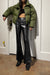 Vegan leather flared pant in black — image