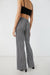 Houndstooth pleated pant in black — image