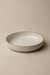 Crest dinner bowl in onyx wash — main image
