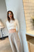Layered long sleeve and cropped tank set in white — main image